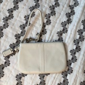 Creme coach wristlet